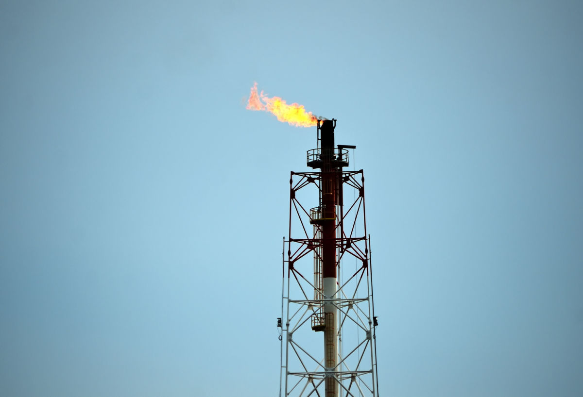 A fracking structure shoots off flames