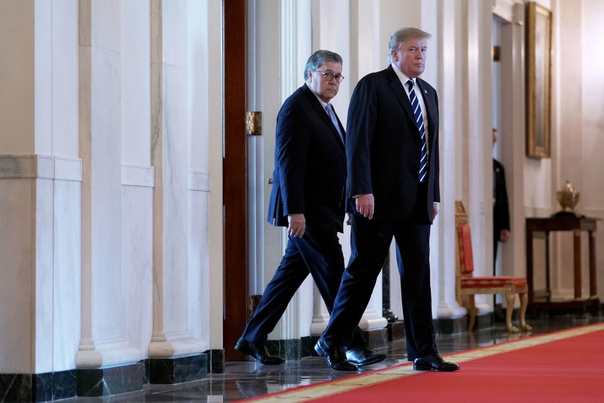 President Trump and Attorney General William Barr arrive together in the East Room of the White House, May 22, 2019, in Washington, D.C.