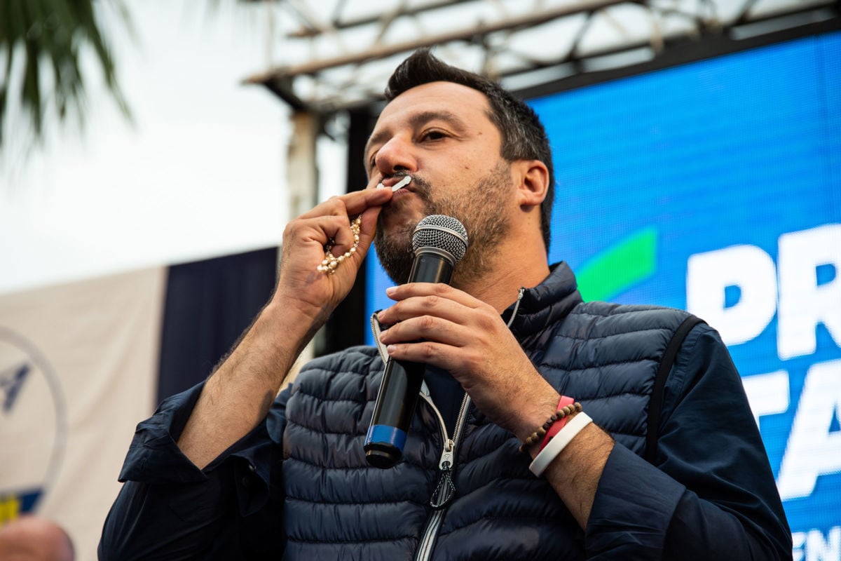 Matteo Salvini kisses a rosary during an election rally on May 31, 2019, in Aversa, Italy.