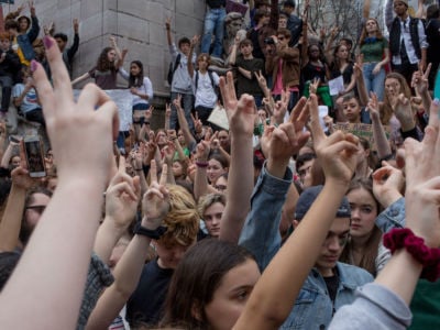 New York City High School students walk out of classes to protest climate change and the government's inaction on March 15, 2019, in Columbus Circle, New York City.