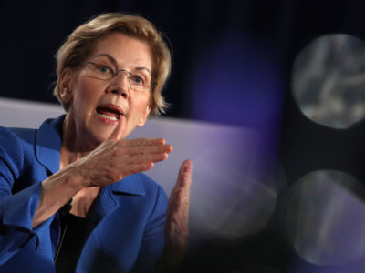 Sen. Elizabeth Warren speaks into a microphone