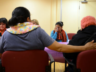 Immigrant women who are victims of violence and domestic abuse talk about their abuse during a weekly meeting at La Clinica Del Pueblo in Columbia Heights, Washington, D.C., on November 22, 2013. The Violence Against Women Act implicitly recognizes the imbalance of power in mixed-status interactions.