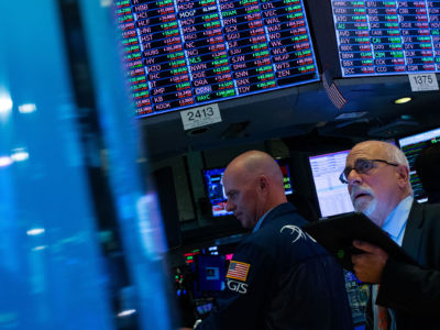 Trader Peter Tachman works on the floor of the New York Stock Exchange (NYSE) on August 23, 2019, in New York City.