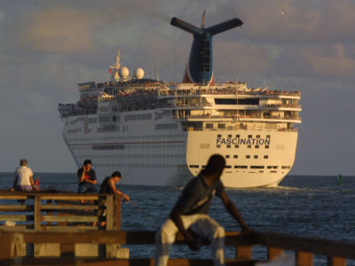 The Carnival Corp. cruise ship Fascination sets sail December 17, 2001, in Miami, Florida.