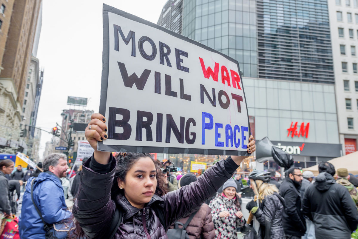 Hundreds took to the streets as antiwar and social justice groups organized a demonstration in New York City, April 15, 2018.