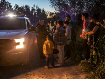 U.S. Border Patrol agents assigned to the McAllen border patrol station encounter a group of migrants near Los Ebanos, Texas, on June 15, 2019.