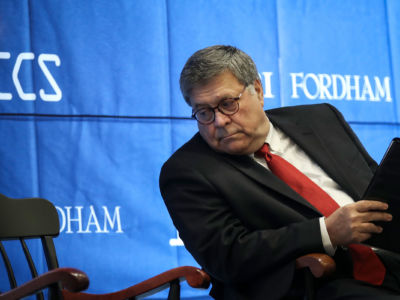 Attorney General William Barr waits to speak at the International Conference on Cyber Security at Fordham University School of Law on July 23, 2019, in New York City.