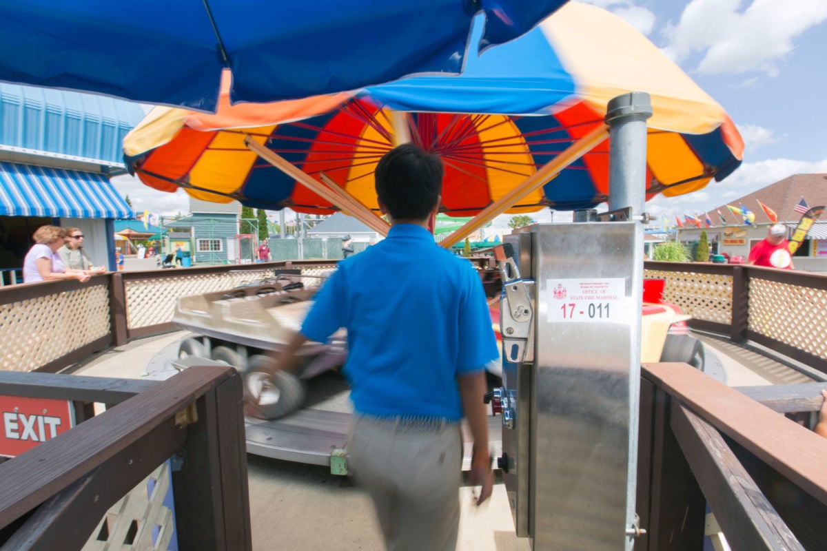 Alex Xie, 19, of China operates the Kiddie Cars at Funtown Splashtown USA. Xie holds a J-1 Visa that allows foreign college students to work in the United States as part of a cultural exchange program.