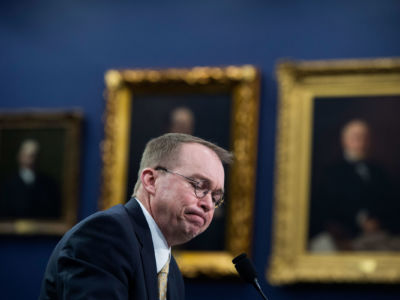 Mick Mulvaney makes a face during a hearing