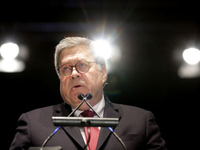 Attorney General William Barr delivers remarks during the National Police Week 31st Annual Candlelight Vigil on the National Mall May 13, 2019, in Washington, D.C.