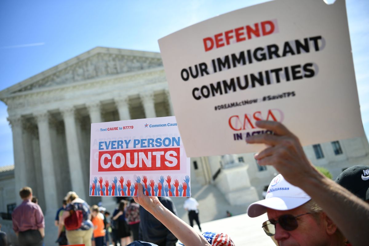 Demonstrators rally at the U.S. Supreme Court in Washington, D.C., on April 23, 2019, to protest a proposal to add a citizenship question in the 2020 Census.