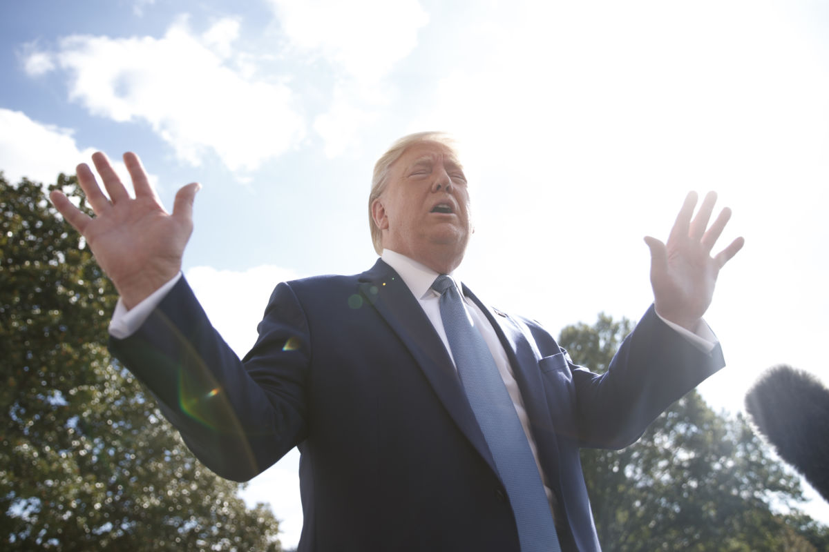 President Donald Trump speaks to the press before boarding Marine One on the South Lawn of the White House on October 4, 2019, in Washington, D.C.