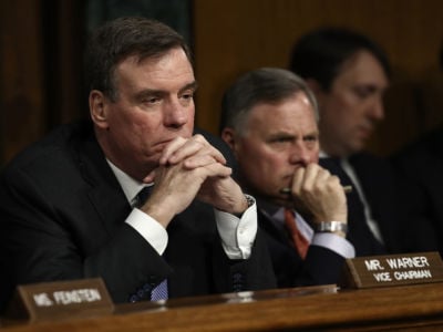 Senate Select Intelligence Committee Chairman Sen. Richard Burr and ranking member Sen. Mark Warner listen to testimony during a hearing on March 30, 2017, in Washington, D.C., on Russian interference during the 2016 election. The Committee recently released a second report calling for sweeping efforts to prevent Russian interference in the 2020 election.