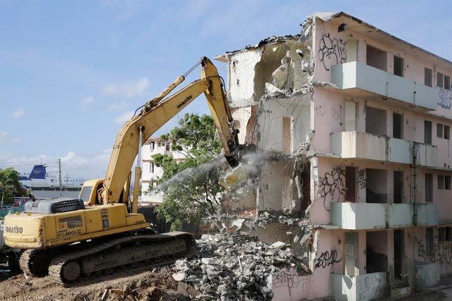 Demolition begins at Puerta de Tierra in 2015.