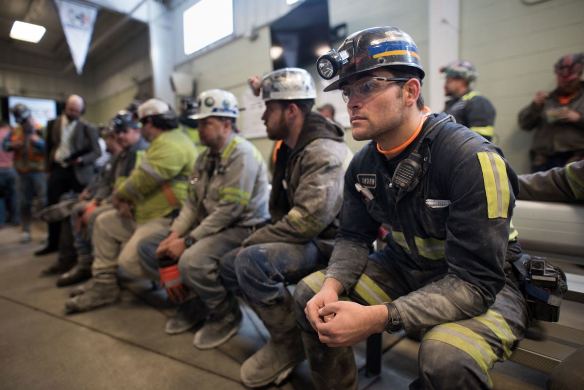 Coal miners wait prior to the arrival of U.S. Environmental Protection Agency Administrator Scott Pruitt, who visited the Harvey Mine on April 13, 2017, in Sycamore, Pennsylvania.