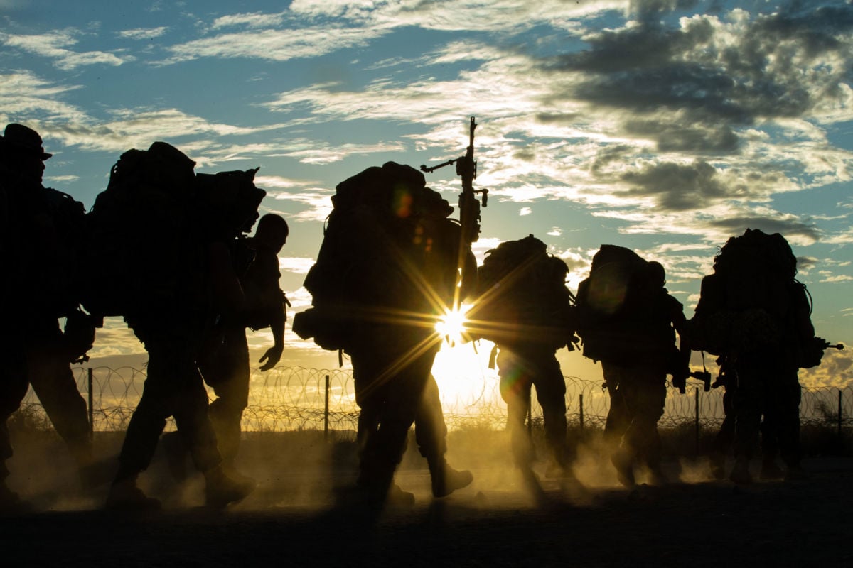 Marines conduct a hike during a training exercise at Marine Corps Air Ground Combat Center, Twentynine Palms, California, November 2, 2019.