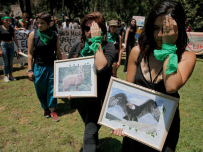 In Santiago, Chile, members of environmental organizations protest to demand urgent action on the climate crisis from world leaders attending the COP25 summit in Spain, on December 6, 2019.