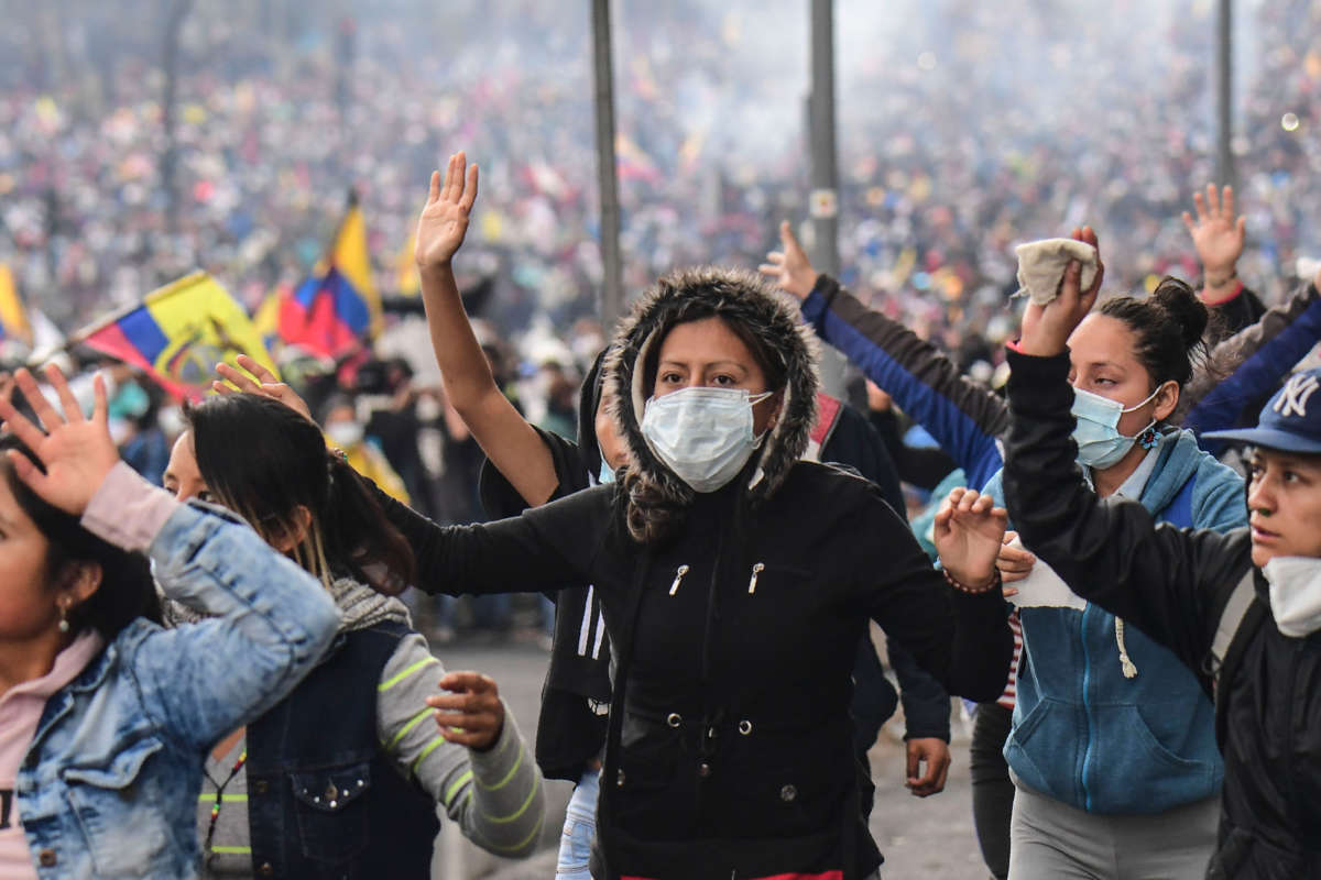 Demonstrators take part in a protest over a fuel price hike ordered by the government to secure an IMF loan, in Quito, Ecuador, on October 11, 2019.