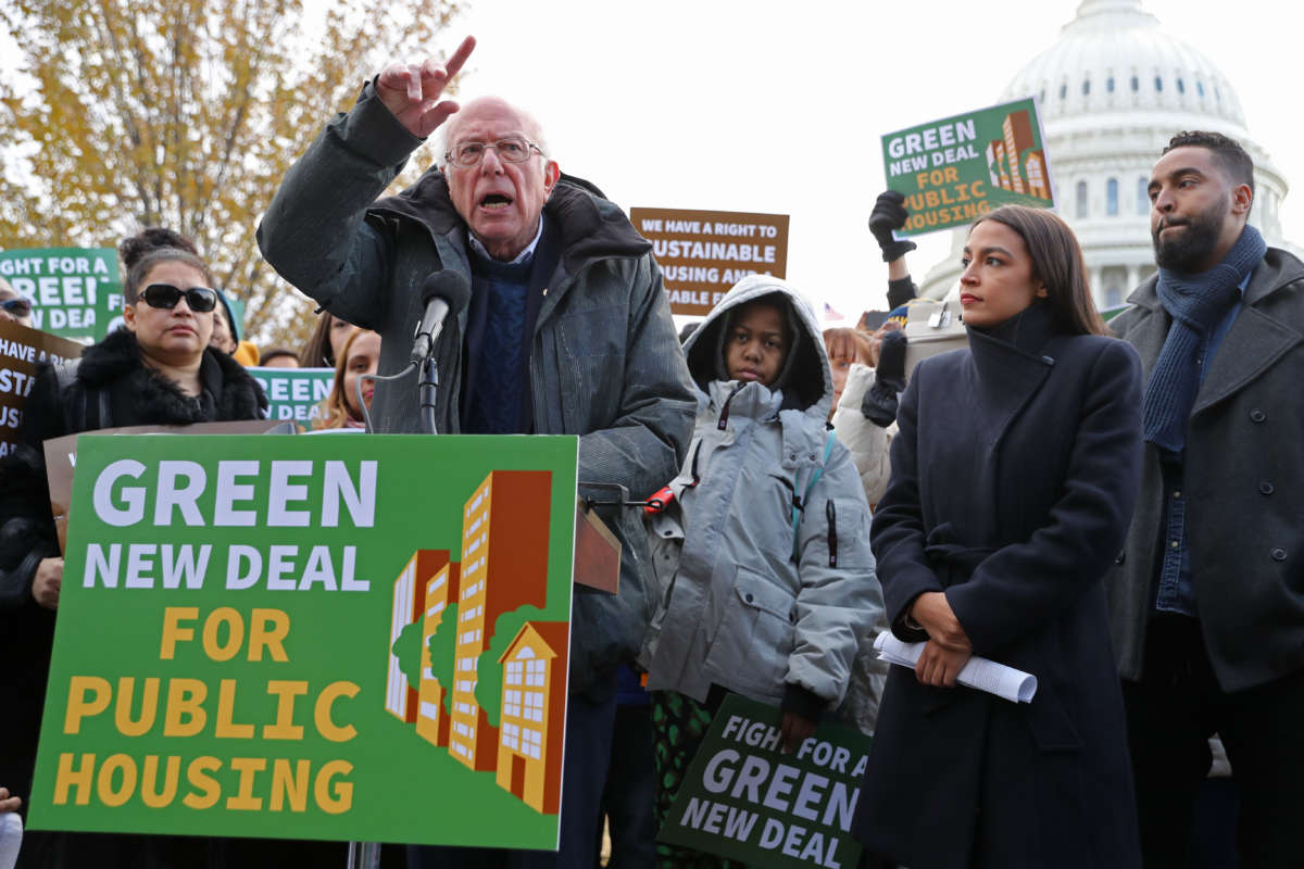 Democratic presidential candidate Sen. Bernie Sanders and Rep. Alexandria Ocasio-Cortez hold a news conference to introduce legislation to transform public housing as part of their Green New Deal proposal outside the U.S. Capitol November 14, 2019, in Washington, D.C.