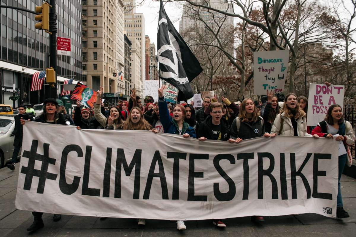 Demonstrators from several environmental groups including Extinction Rebellion and Sunrise Movement demand broad action at a youth-led climate strike near City Hall on December 6, 2019, in New York City.