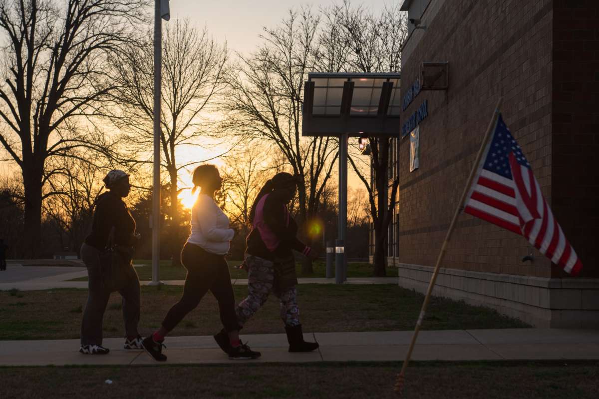 Last-minute voters arrive to cast their vote during Missouri primary voting at Johnson-Wabash Elementary School on March 15, 2016, in Ferguson, Missouri.