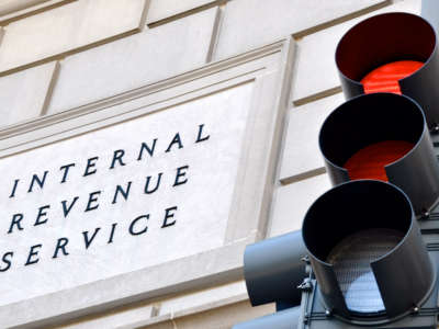 Internal Revenue Service sign with stoplight