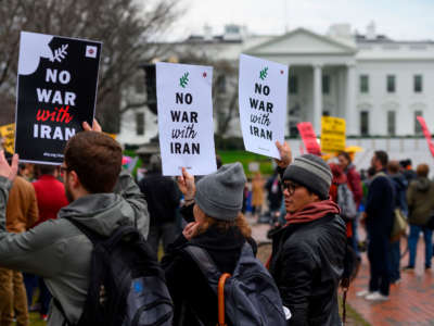 Anti-war activists protest in front of the White House in Washington, D.C., on January 4, 2020.