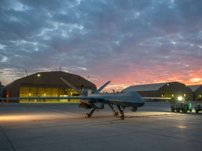 An MQ-9 Reaper drone of the sort used in the assassination of an Iranian military leader sits on the ramp at Kandahar Airfield, Afghanistan, December 6, 2015.