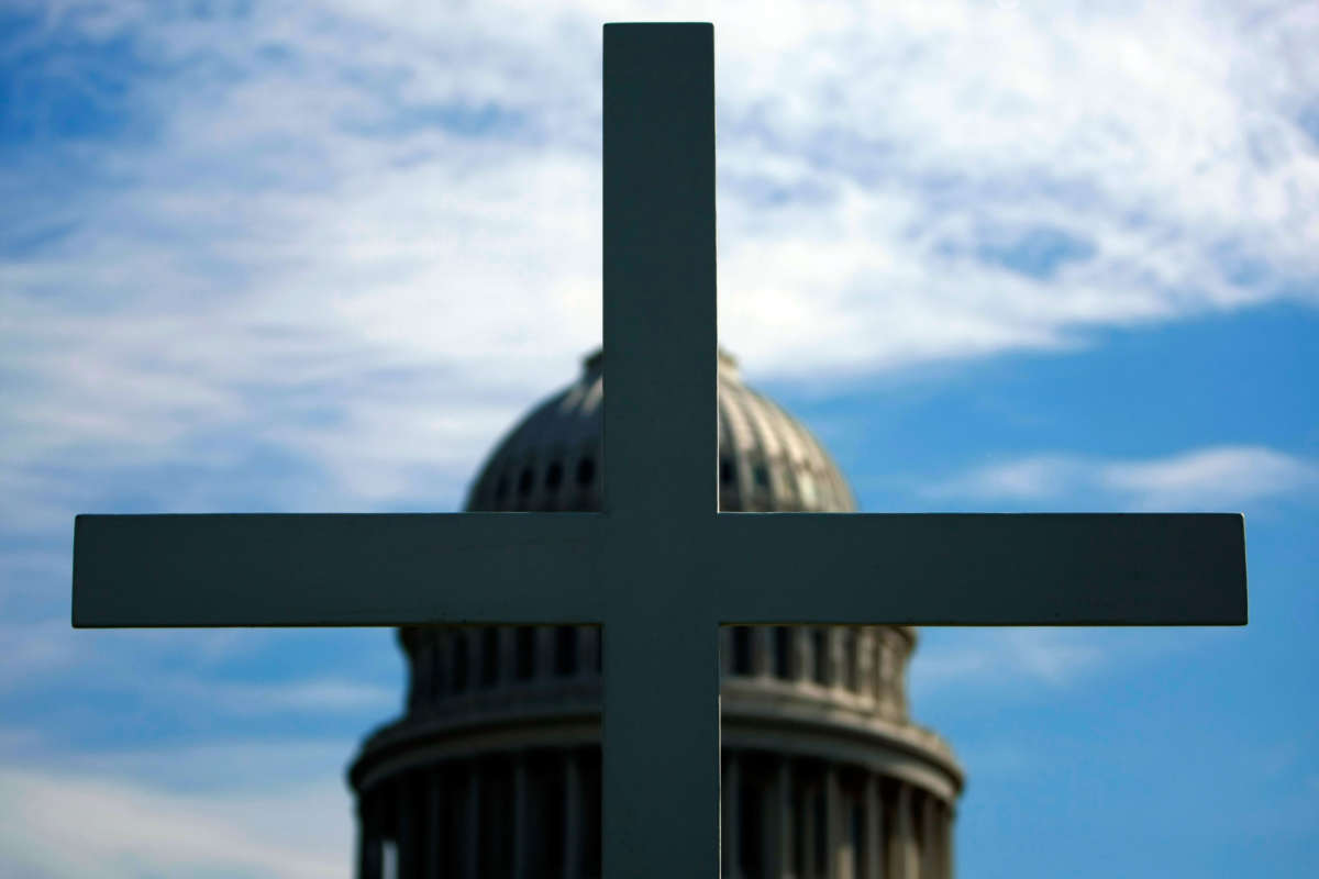 A 16-foot cross planted in front of the U.S. Capitol is displayed as part of a prayer vigil, October 6, 2008, in Washington, D.C.