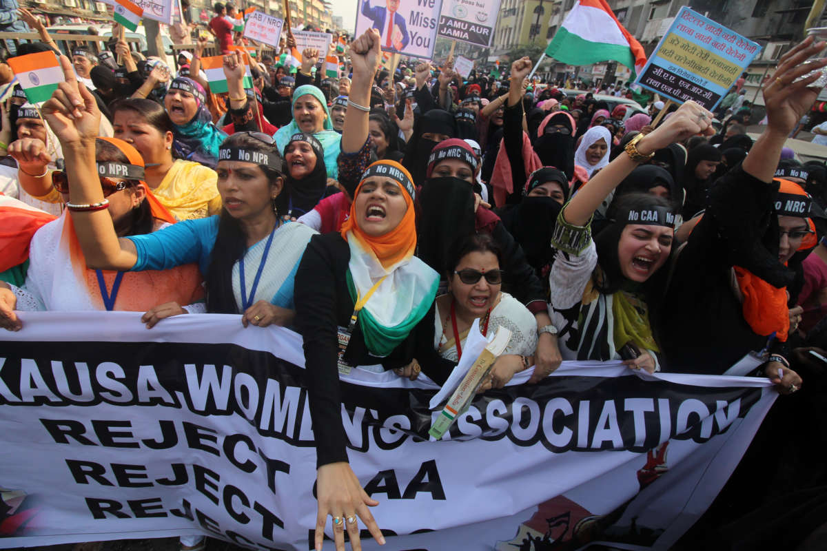 Women shout slogans during a protest against the Citizenship Amendment Act (CAA), National Register of Citizens (NRC) and National Population Register (NRP) at the outskirts of Mumbai, India, on January 26, 2020.