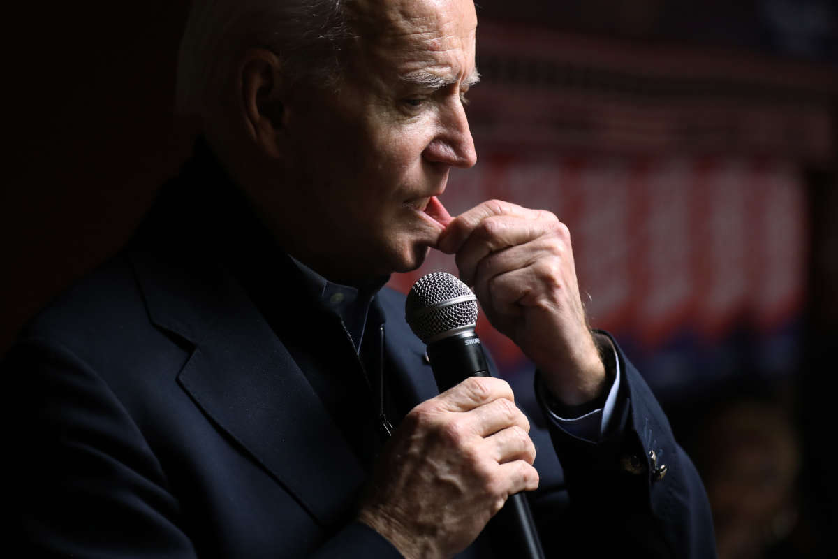 Joe Biden pulls on his bottom lip