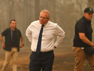 Prime Minister Scott Morrison tours a property hit by bushfires on January 3, 2020, in Sarsfield, Victoria, Australia.