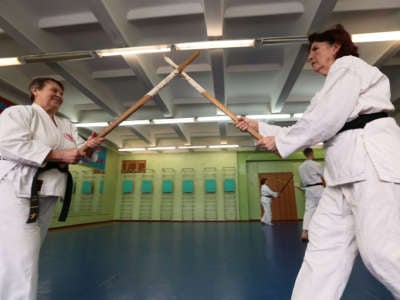 Women take part in a lesson at the Siberian Yoshinkan Aikido Federation in Novosibirsk, Russia, March 30, 2016.