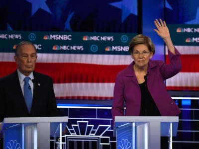 Sen. Elizabeth Warren gestures next to former New York Mayor Mike Bloomberg during the ninth Democratic primary debate of the 2020 presidential campaign season at the Paris Theater in Las Vegas, Nevada, on February 19, 2020.