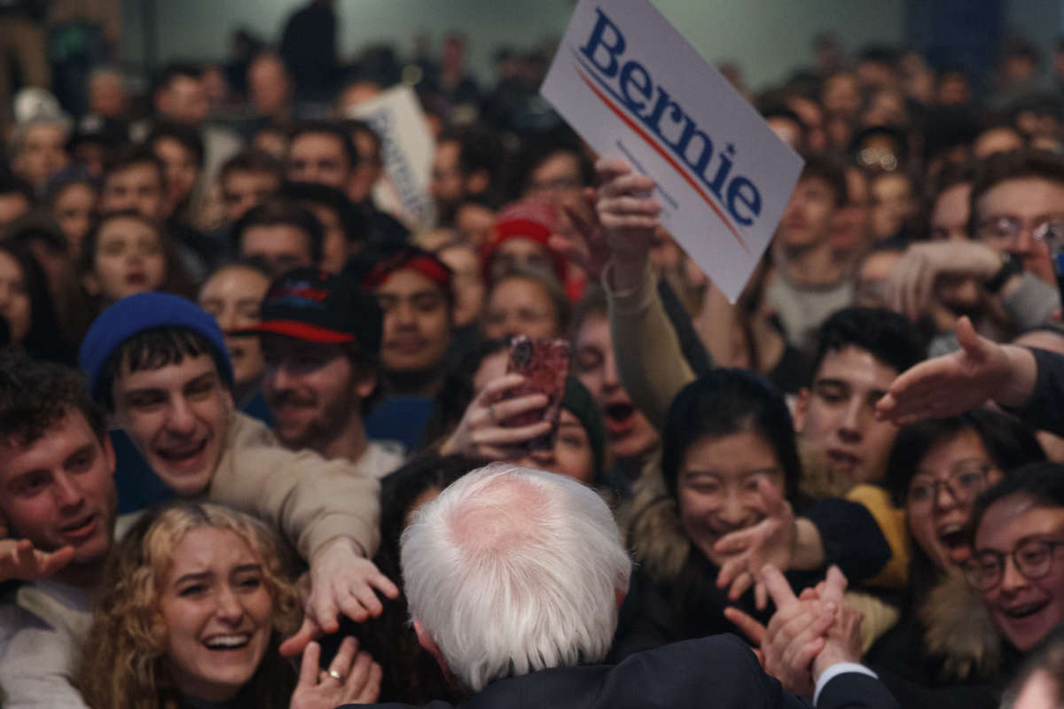 Democratic presidential candidate Sen. Bernie Sanders greets rally attendees after speaking at a campaign rally at the U.S. Bank Arena on February 1, 2020, in Cedar Rapids, United States.