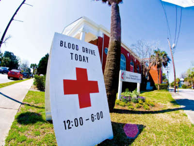 A sign advertising a blood drive