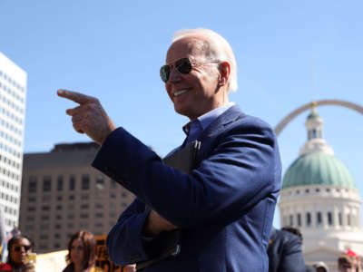 Former Vice President Joe Biden waits to take the stage at a campaign rally at Kiener Plaza on March 7, 2020, in St. Louis, Missouri.