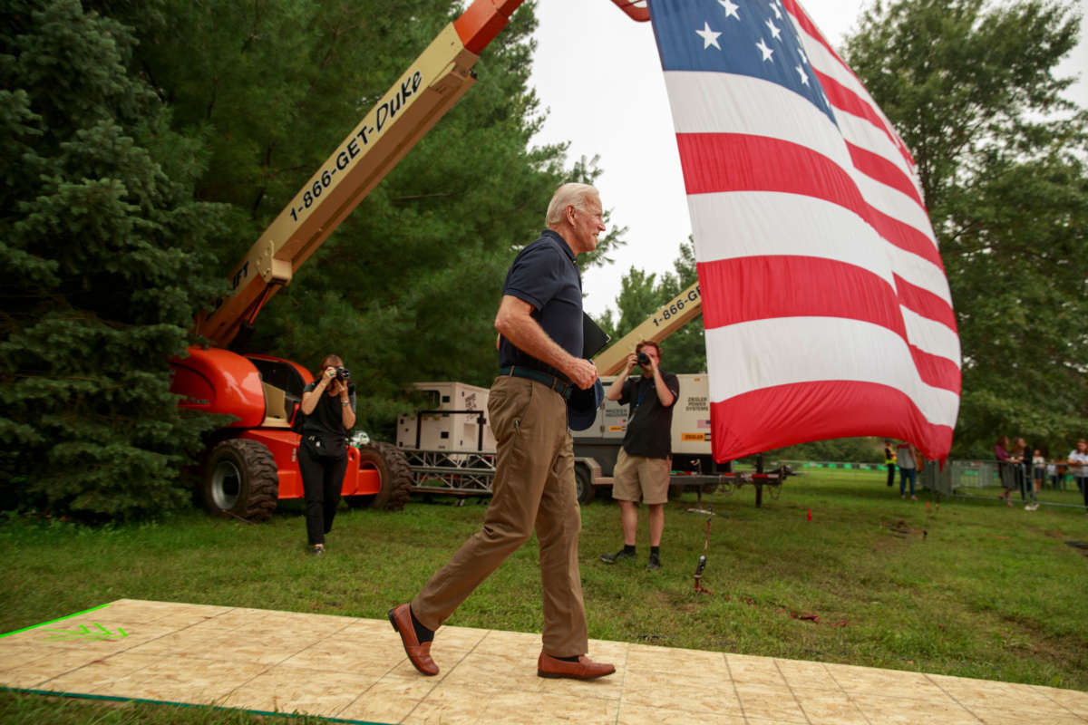 Former Vice President Joe Biden walks to a stage to give a speech during the Polk County Steak Fry at the Water Works Park in Des Moines, Iowa, September 21, 2019.