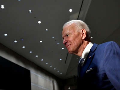 Former Vice President Joe Biden walks out after speaking at the National Constitution Center in Philadelphia, Pennsylvania, on March 10, 2020.