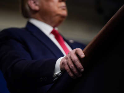 Donald Trump's hands on a podium
