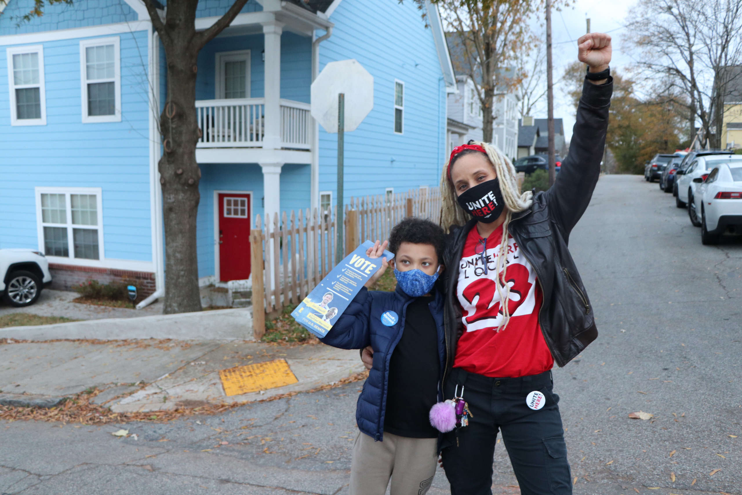 Amber Young, UNITE HERE canvasser, with her son.