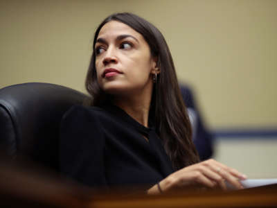 Rep. Alexandria Ocasio-Cortez listens to testimony before the House Oversight and Reform Committee on July 18, 2019, in Washington, D.C.