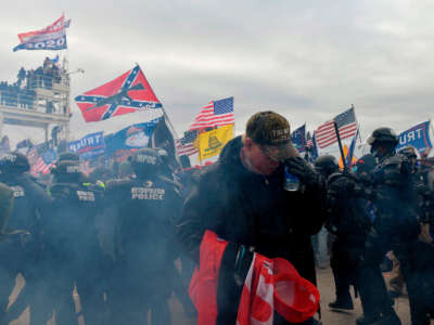 Trump supporters clash with police and security forces as people try to storm the U.S. Capitol Building in Washington, D.C., on January 6, 2021.