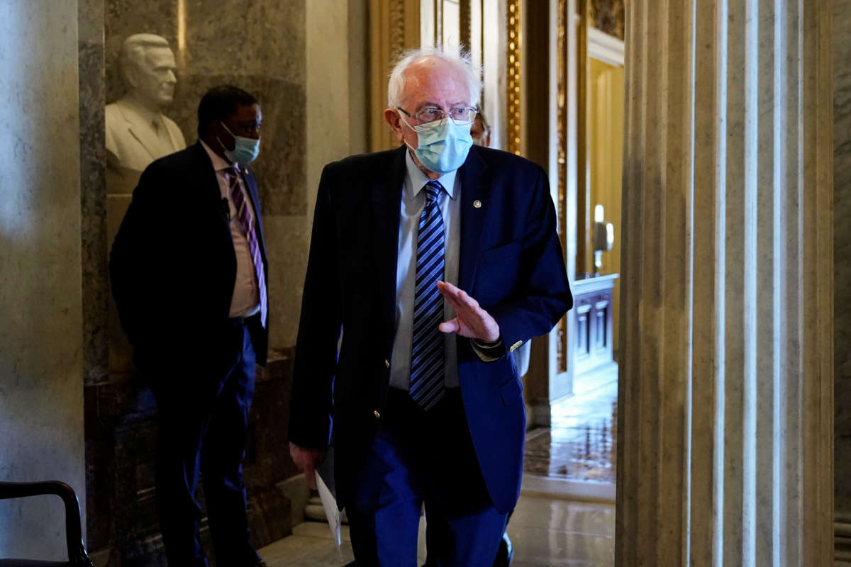 Sen. Bernie Sanders walks through Capitol Hill on December 31, 2020, in Washington, D.C.
