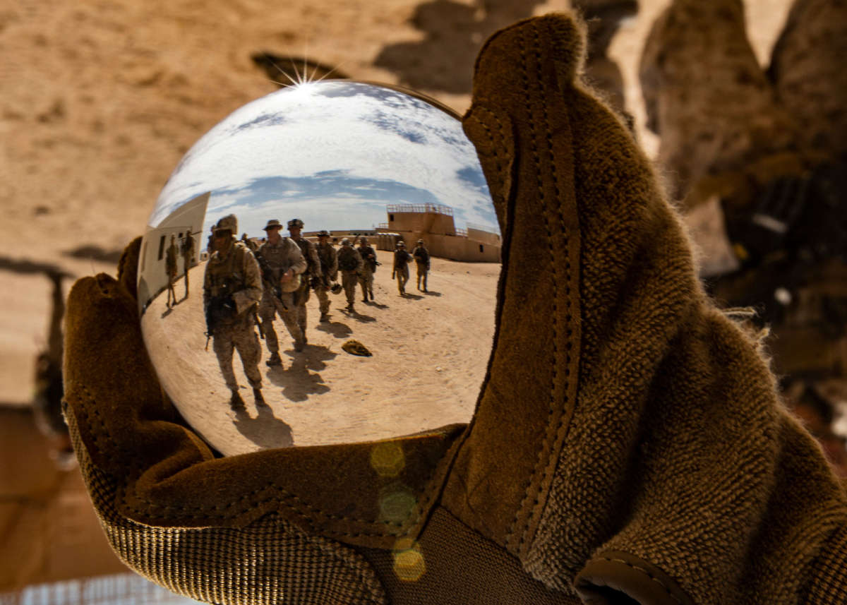 U.S. Marines hike during a training exercise at Marine Corps Air Ground Combat Center Twentynine Palms, California, July 31, 2019.