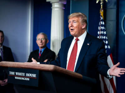 President Trump speaks with members of the coronavirus task force during a briefing in the James S. Brady Press Briefing Room at the White House on March 25, 2020, in Washington, D.C.