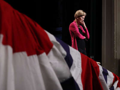 Sen. Elizabeth Warren pauses while listening to a question from an audience member during a campaign event at The Colonial Theatre, February 4, 2020, in Keene, New Hampshire.