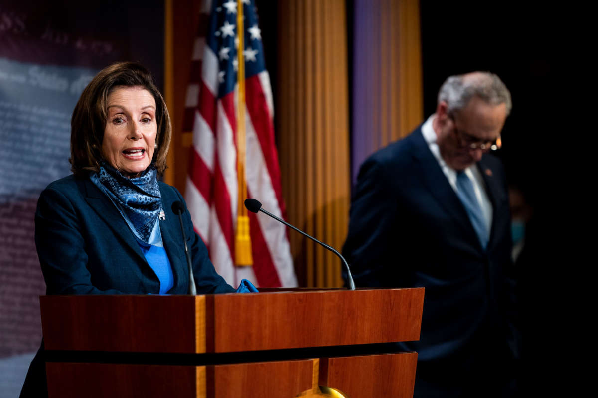 Speaker of the House Nancy Pelosi and Senate Minority Leader Chuck Schumer hold a socially distanced press conference in the Capitol after the Senate passed coronavirus relief during a pro forma session on Tuesday, April 21, 2020.