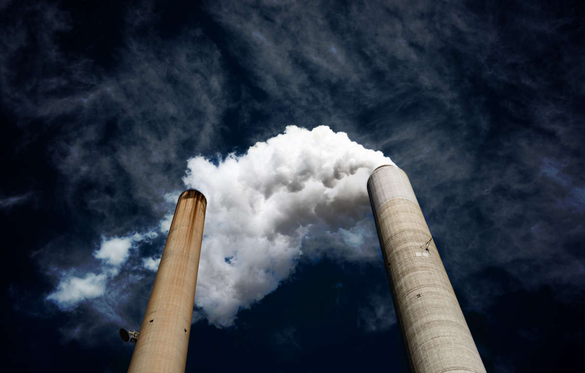 The smoke stacks at American Electric Power's (AEP) Mountaineer coal power plant in New Haven, West Virginia, October 30, 2009. AEP ran a pilot program starting in 2009 to capture carbon on-site at the Mountaineer plant, but shelved further developments after the program's completion in 2011.