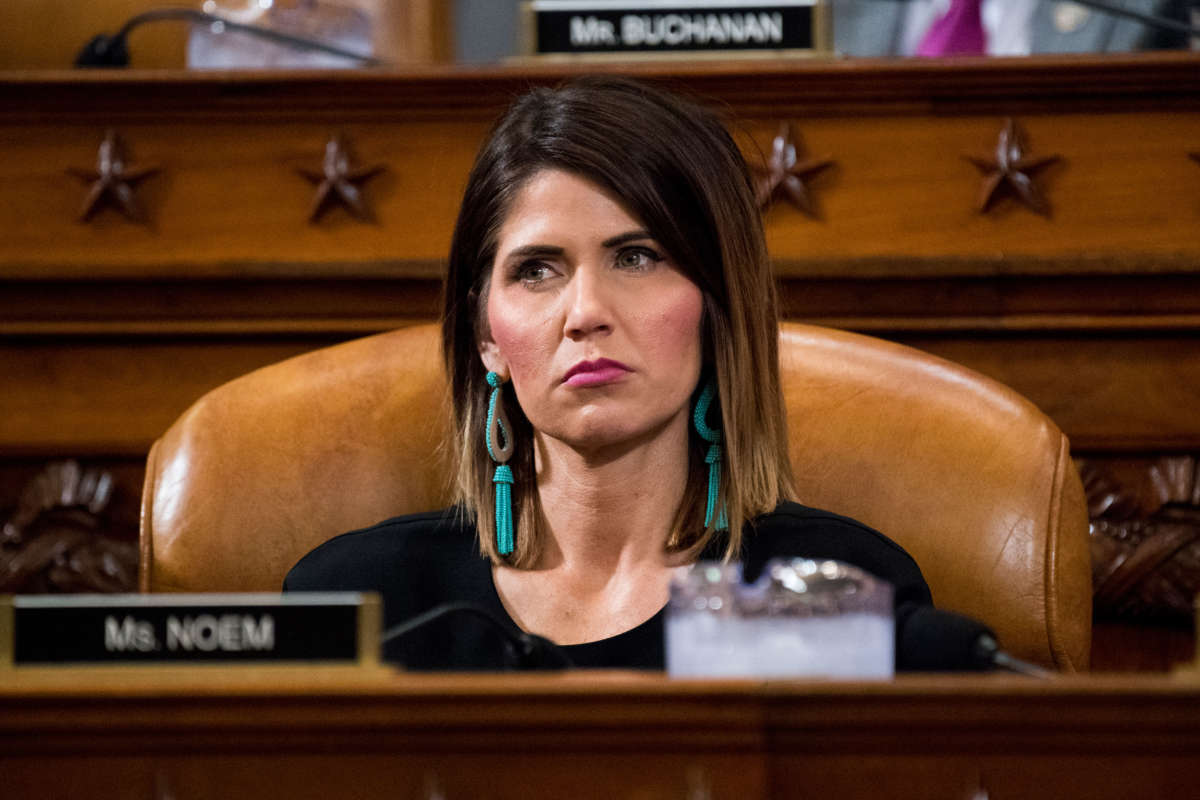 Then-Rep. Kristi Noem listens during a House Ways and Means Committee hearing, May 24, 2017. The South Dakota governor has refused to issue a statewide stay-at-home order.